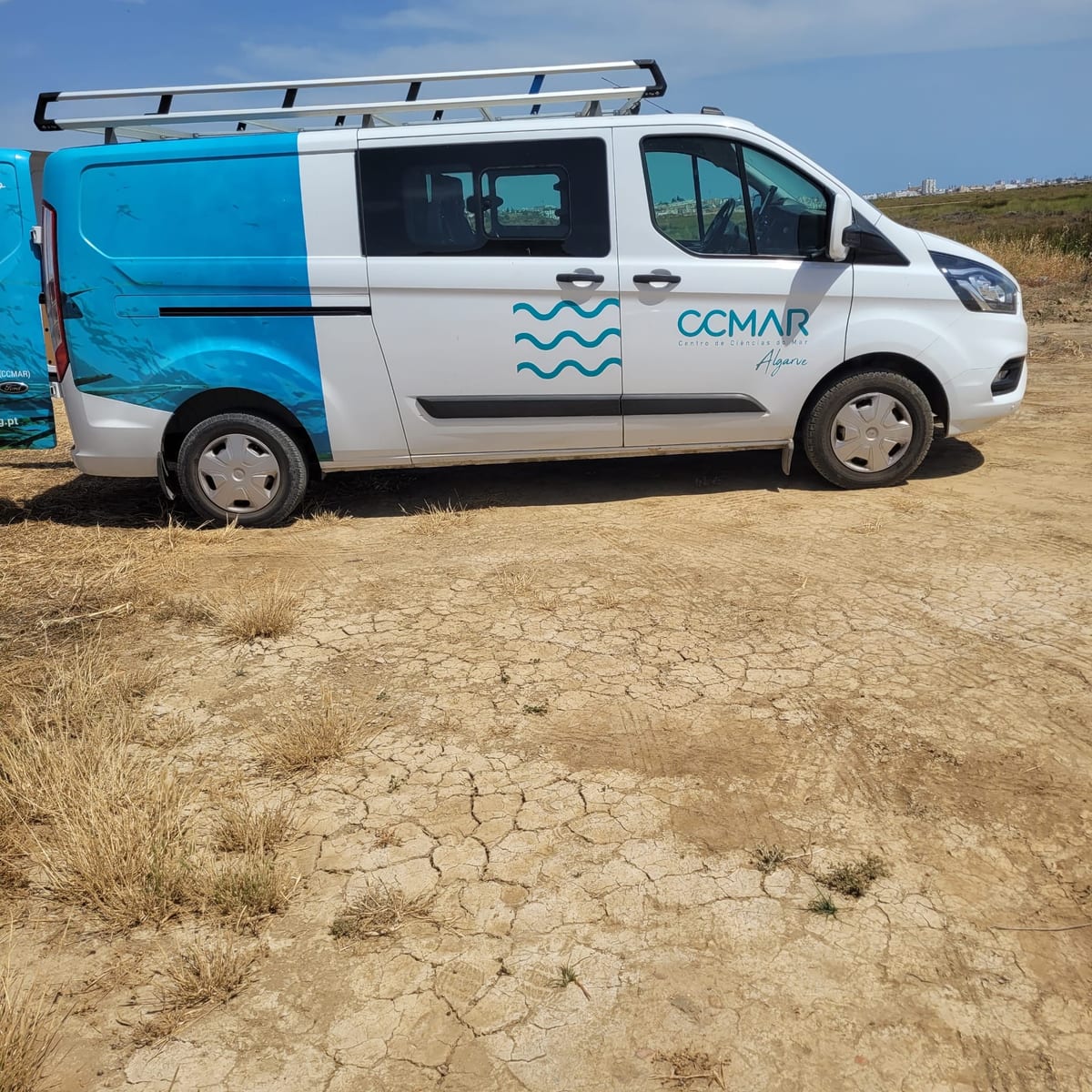 The CCMAR (Centro de Ciências do Mar) field van parked beside the Sal Correia salinas.